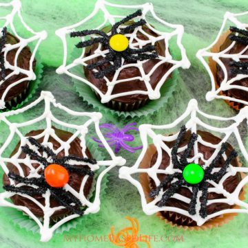 Make these adorable Spider Web Cupcakes in a flash with easy instructions. The perfect dessert idea for spider recipes for your parties. #spiderrecipes #spiderwebcupcakes #dessertidea #halloween | Spider Web Cupcakes | Halloween Cupcakes | Halloween Food | Halloween Party | DIY Halloween | Spider Cupcakes | Spiderweb Cupcakes