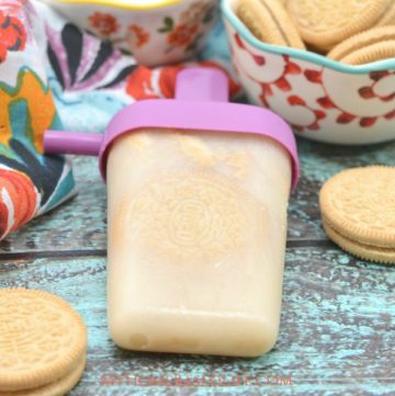 Summer is almost here and there isn't a better time for milk and cookies popsicles. A great combo of ice cream and popsicle. They're also super budget friendly! #popsicles #recipe #budgetfriendly #milkandcookies #summer | Summer Time Fun | Popsicle Recipe | Milk and Cookie Recipe | Dessert Recipe | Desserts |