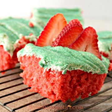 Grab the kids and have them make this Simple Strawberry Jello Cake Recipe with you. It sure won't last long after it is done. #jello #cake #strawberry #recipe #video | Food Video | Jello Cake | Dessert Recipe | Strawberry Recipe