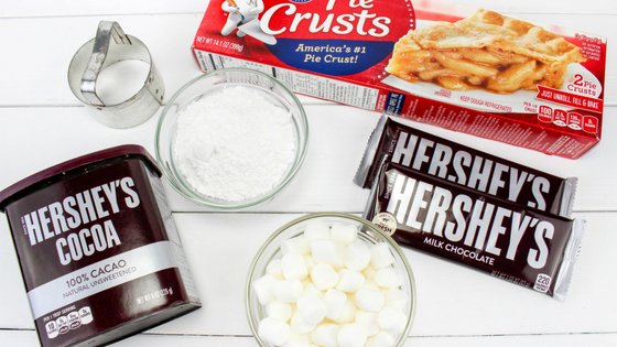 Mini smores pies are easy to make and perfect for summertime with little mess. It's like having a campfire year round with these amazing pies! #smores #pies #handpies #campingrecipe #myhomebasedlife | Pie Recipes | Hand Pie Recipes | Smores Recipes | Camping Recipes |