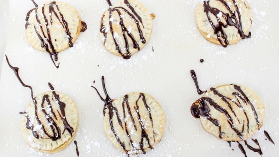 Mini smores pies are easy to make and perfect for summertime with little mess. It's like having a campfire year round with these amazing pies! #smores #pies #handpies #campingrecipe #myhomebasedlife | Pie Recipes | Hand Pie Recipes | Smores Recipes | Camping Recipes |