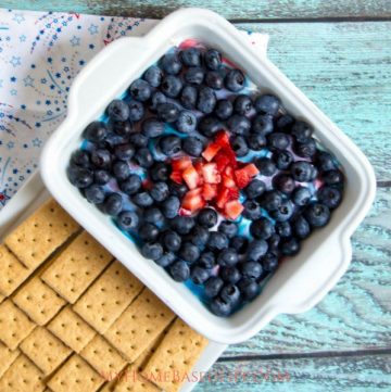 With the upcoming 4th of July holiday, I knew I had to create an amazing dessert recipe for us and this Red White and Blue Cheesecake Dip was it! #cheesecakedip #redwhiteblue #diprecipe #dessert | Dessert Recipes | Dip Recipes | Red White Blue Foods | Patriotic Recipes | Cheesecake Recipes