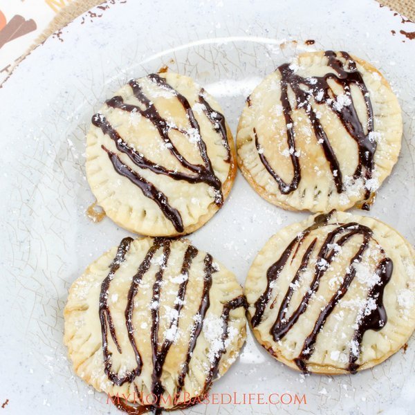 Mini smores pies are easy to make and perfect for summertime with little mess. It's like having a campfire year round with these amazing pies! #smores #pies #handpies #campingrecipe #myhomebasedlife | Pie Recipes | Hand Pie Recipes | Smores Recipes | Camping Recipes |