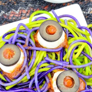 We made this Spaghetti and Eyeballs recipe this year for Halloween Dinner and they went crazy. I am always trying to do different things so it was fun. #halloweenrecipe #spaghetti #eyeballs #halloweendinner #myhomebasedlife | Halloween Dinner Recipes | Halloween Recipes | Food Art | Spaghetti Recipe | Dinner Recipe