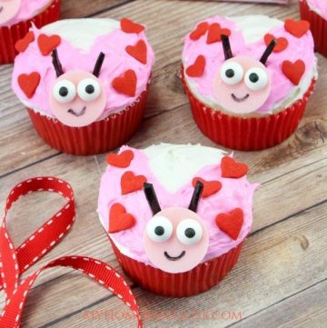I have the perfect dessert recipe for you to make for your kiddos this Valentine's Day. These Love Bug Cupcakes are super easy and simple. #valentinesday #dessertrecipe #lovebugs #myhomebasedlife | Valentine's Day Desserts | Food Art | Love Bug Recipes | Cupcake Recipes | Chocolate Desserts | Simpler Desserts |